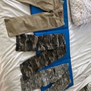 Lot of three- boys pants size 7/8- two camo and one tan- no rips or stains.